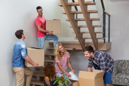 Furniture removal team handling a move in Colliers Wood