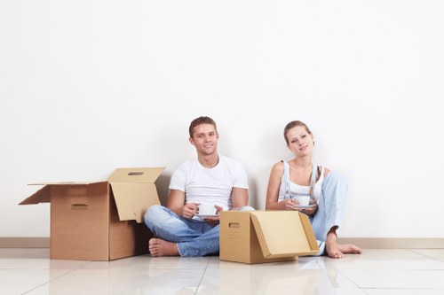 Removal van and movers ready for short notice collection in Colliers Wood