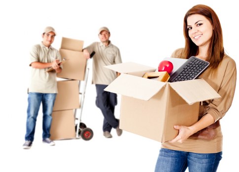 Packed boxes and furniture ready for removals in Colliers Wood