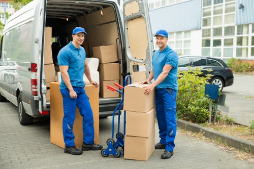 Packed commercial boxes and workstations for a local office move