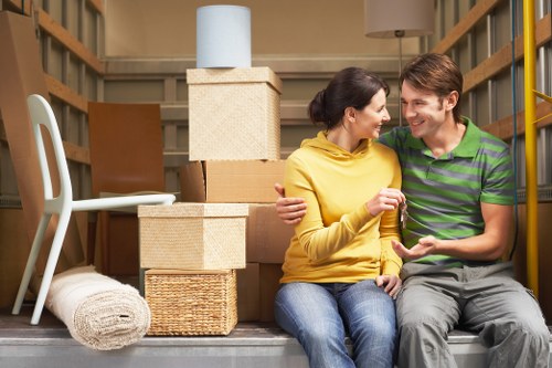 Packed household boxes and furniture ready for transport